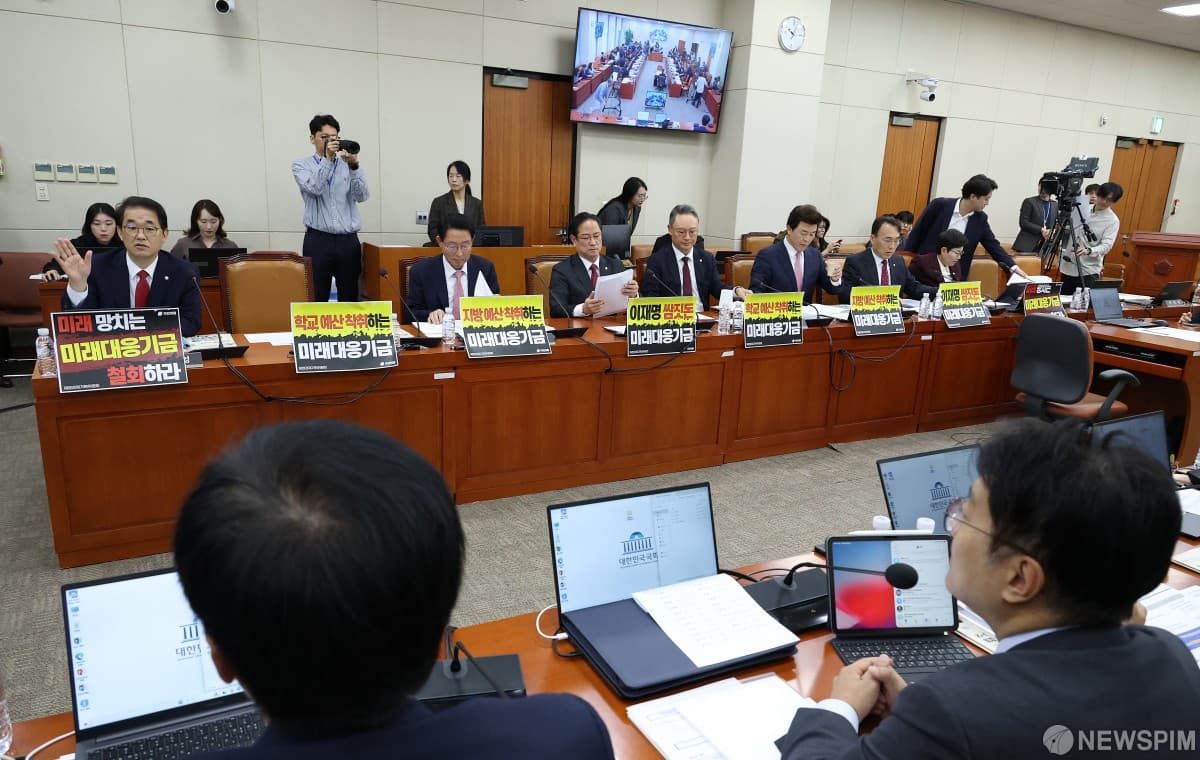 김상훈, 초과세수 부채 상환 주장